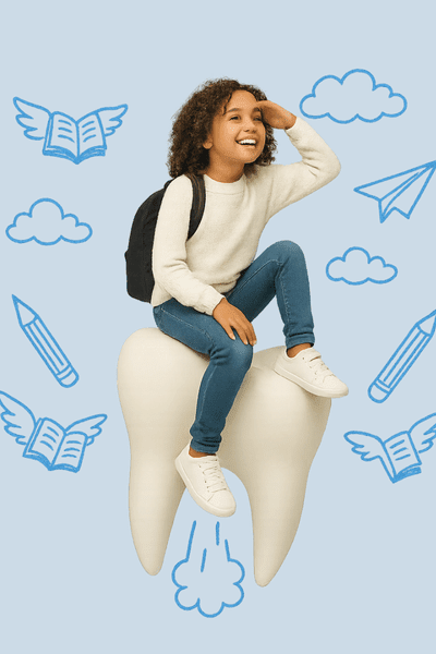 Smiling child on tooth-shaped prop — creative orthodontic display in Vancouver